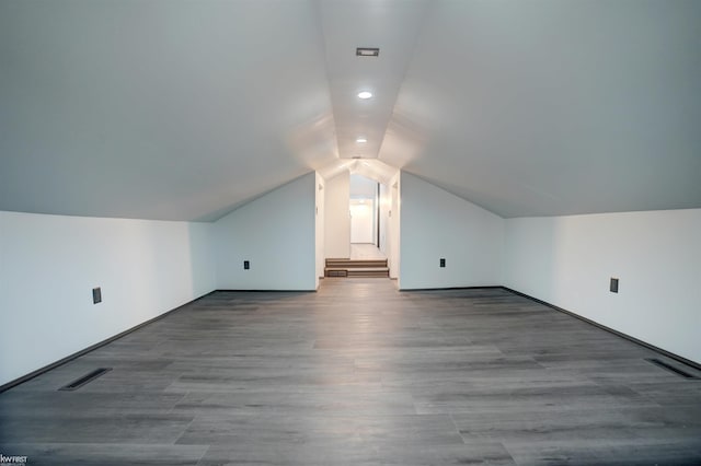 bonus room with vaulted ceiling