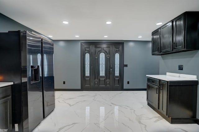 kitchen featuring black fridge