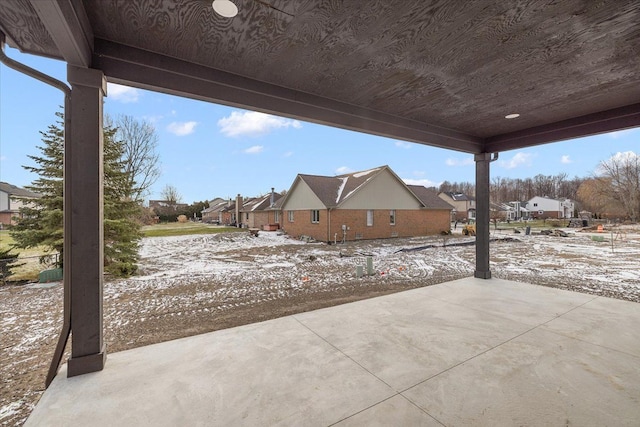 view of snow covered patio