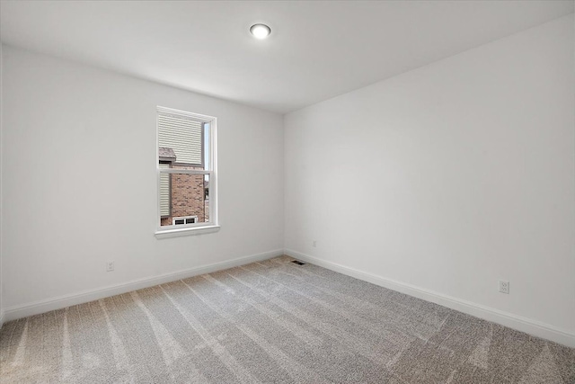 view of carpeted spare room