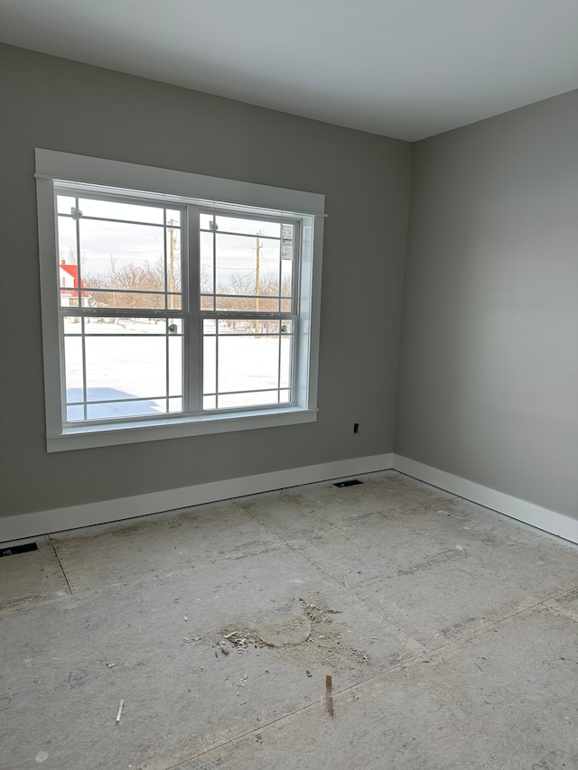 spare room featuring a healthy amount of sunlight