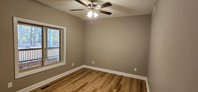 unfurnished room with wood-type flooring and ceiling fan