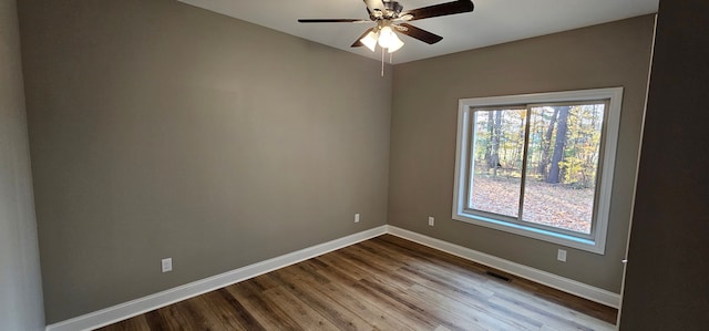 empty room featuring ceiling fan and light wood-type flooring