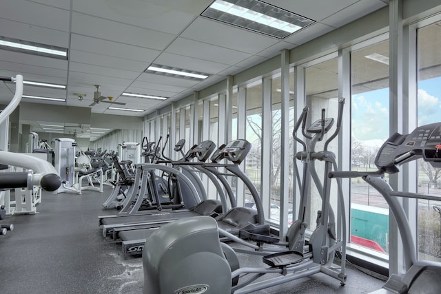 workout area featuring a drop ceiling