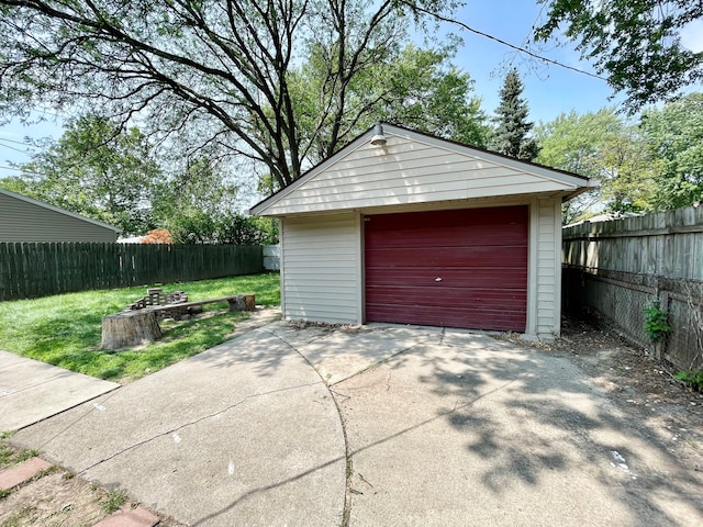 garage featuring a yard