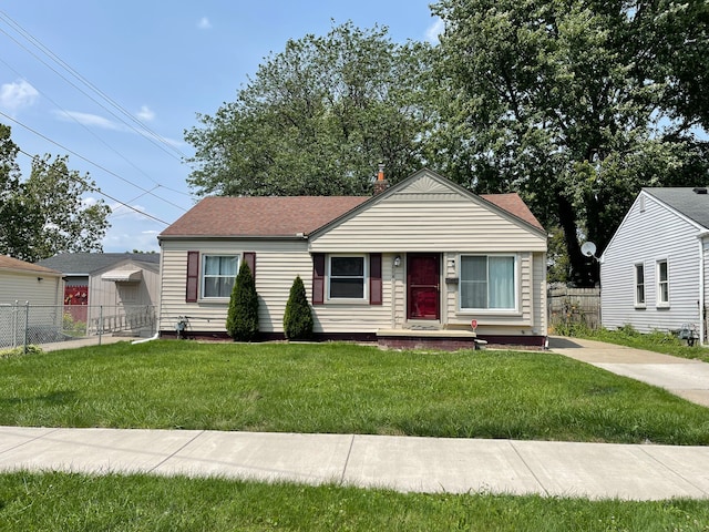 view of front facade featuring a front yard