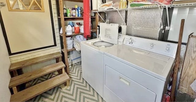 laundry room featuring independent washer and dryer