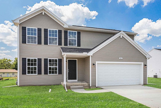 view of front facade featuring a front lawn and a garage