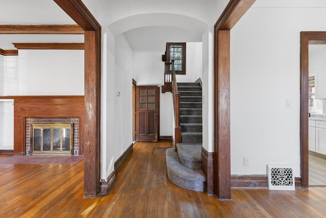 hallway with dark wood-type flooring