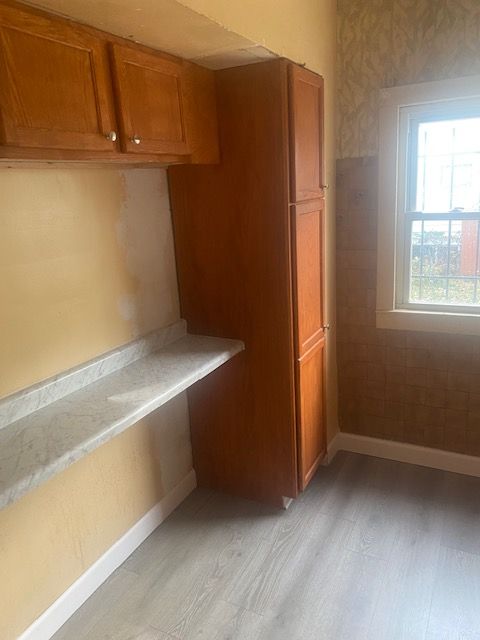 kitchen with light hardwood / wood-style flooring