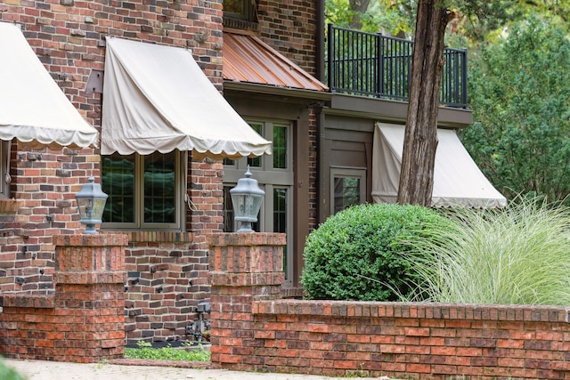 doorway to property with a balcony