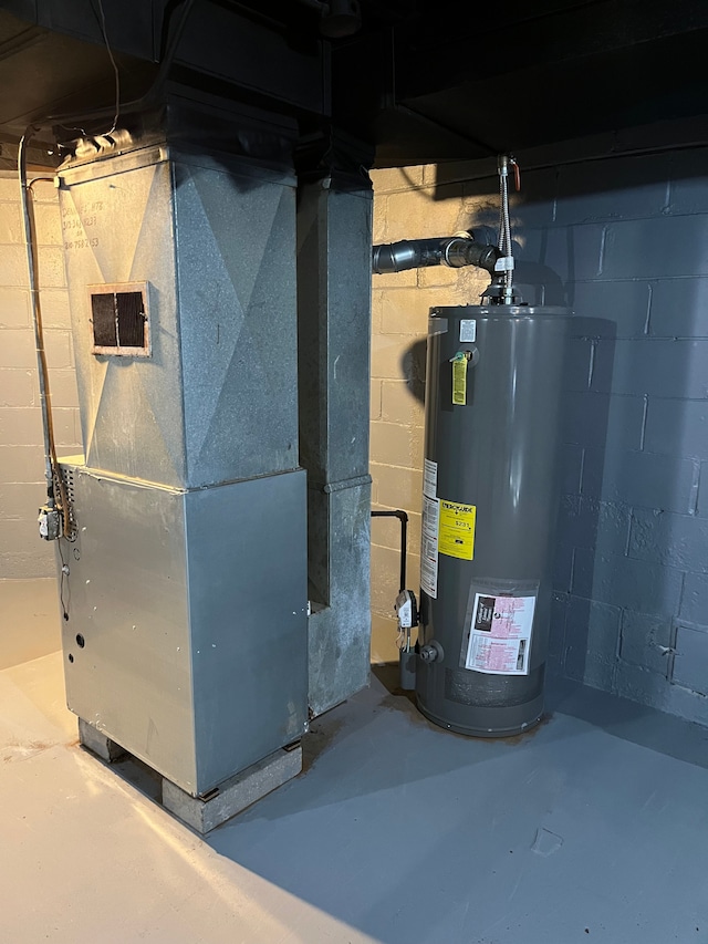 utility room with gas water heater and heating unit