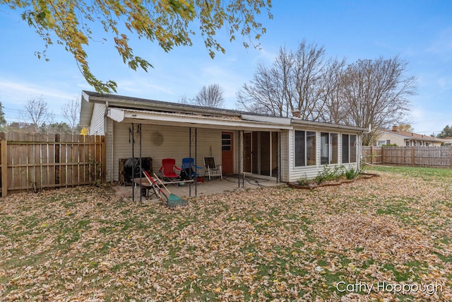 rear view of house with a patio area