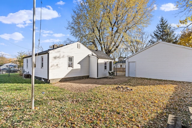 view of home's exterior featuring a yard and central air condition unit