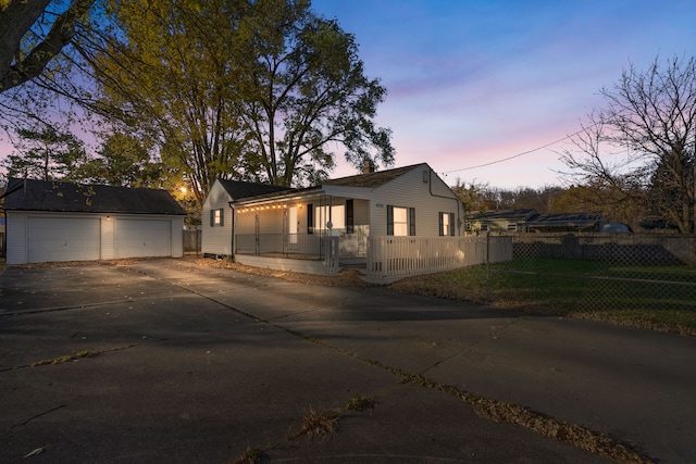 view of front of house with an outbuilding and a garage