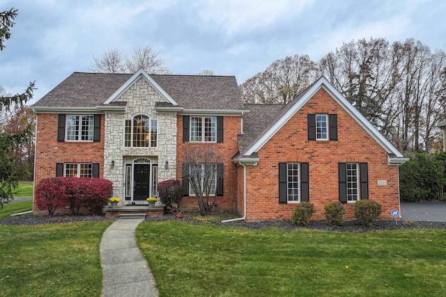 view of front of property with a front yard