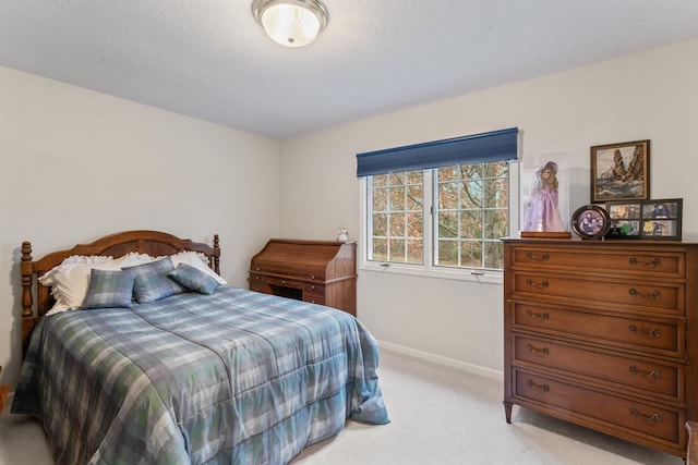 bedroom with light carpet