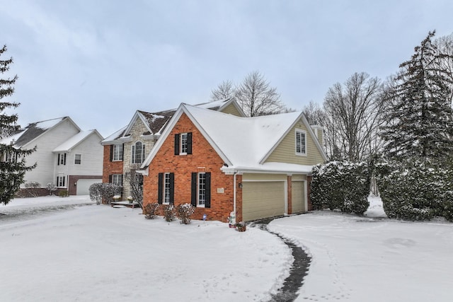 front of property with a garage