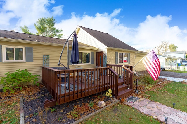 exterior space featuring a wooden deck