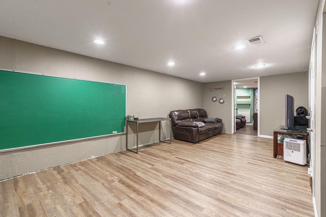 living room featuring light wood-type flooring