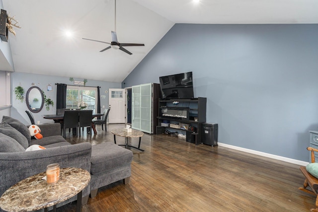 living room with ceiling fan, high vaulted ceiling, and hardwood / wood-style flooring