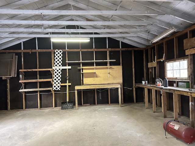 4465 Filter Rd, Harrison, MI 48625 - garage featuring a workshop area