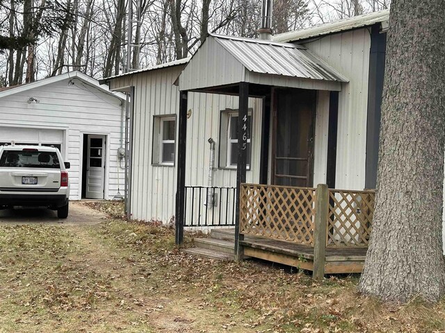 4465 Filter Rd, Harrison, MI 48625 - view of outbuilding with a garage