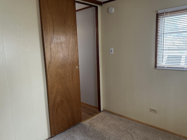 4465 Filter Rd, Harrison, MI 48625 - unfurnished bedroom with carpet floors and multiple windows