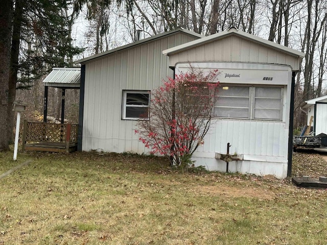 4465 Filter Rd, Harrison, MI 48625 - view of property exterior featuring a yard