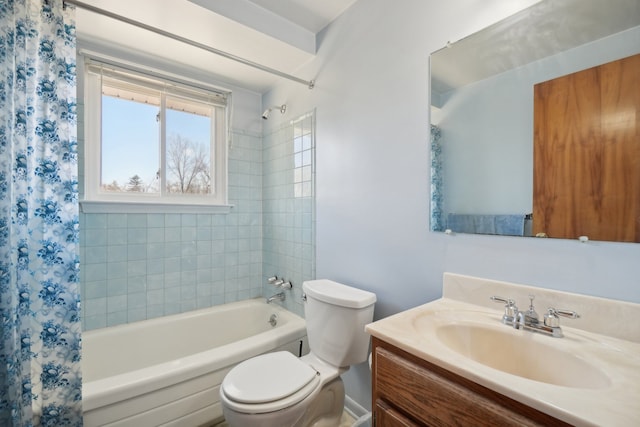 full bathroom featuring vanity, toilet, and shower / bath combo