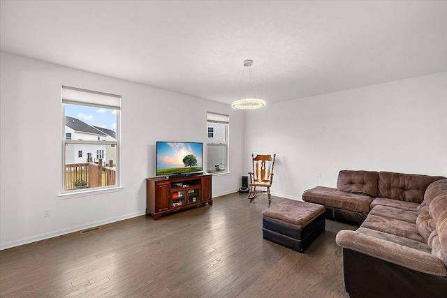 living room featuring dark wood-type flooring