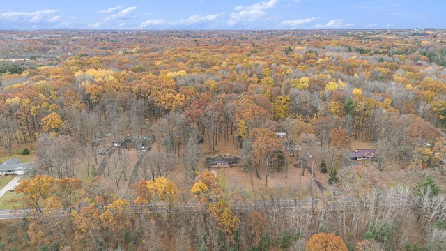 288 E 88th St, Newaygo, MI 49337 - aerial overview of property's location with a heavily wooded area
