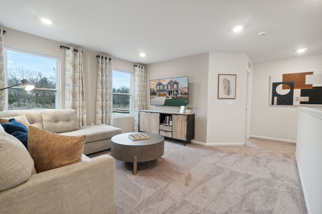 living room featuring light colored carpet