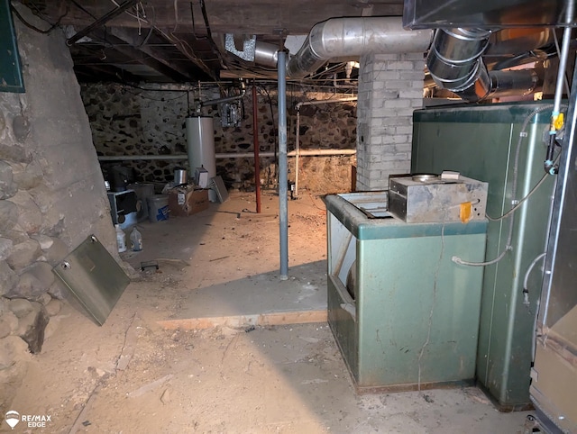 utility room featuring gas water heater