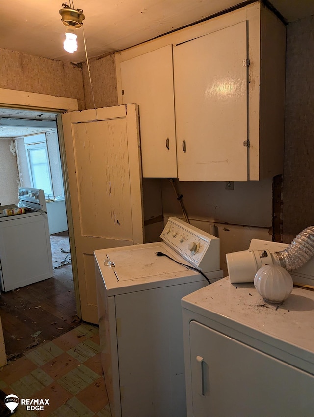 laundry area with washing machine and dryer