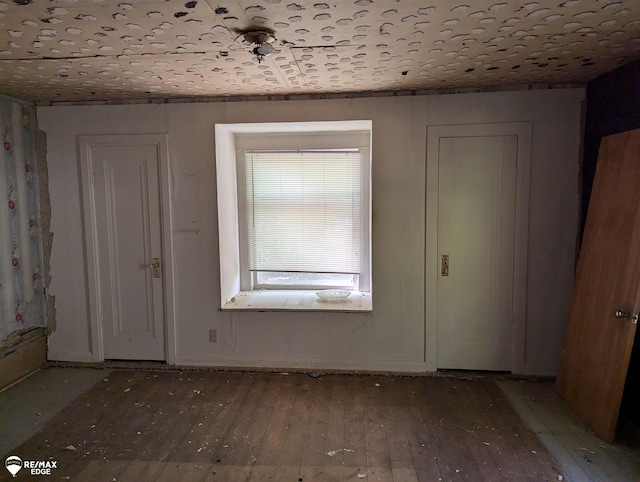 foyer entrance featuring hardwood / wood-style flooring