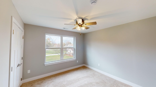 unfurnished bedroom with carpet and ceiling fan