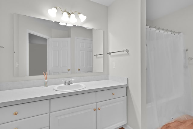 bathroom with vanity and shower / bathtub combination with curtain