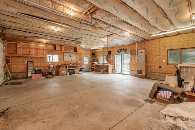 interior space featuring a workshop area and a wealth of natural light