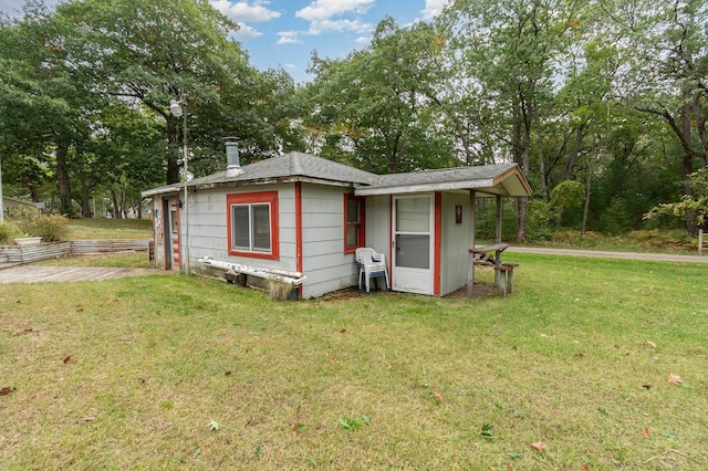 exterior space with a yard