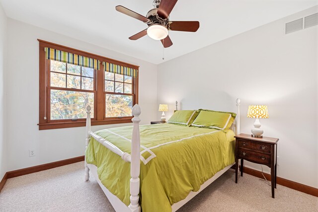 5722 Dunham Path, Stevensville, MI 49127 - carpeted bedroom with baseboards and ceiling fan