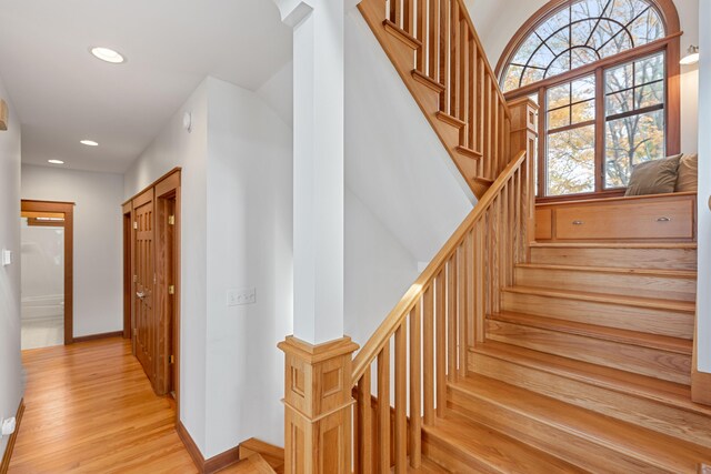 5722 Dunham Path, Stevensville, MI 49127 - staircase featuring wood finished floors, baseboards, and recessed lighting