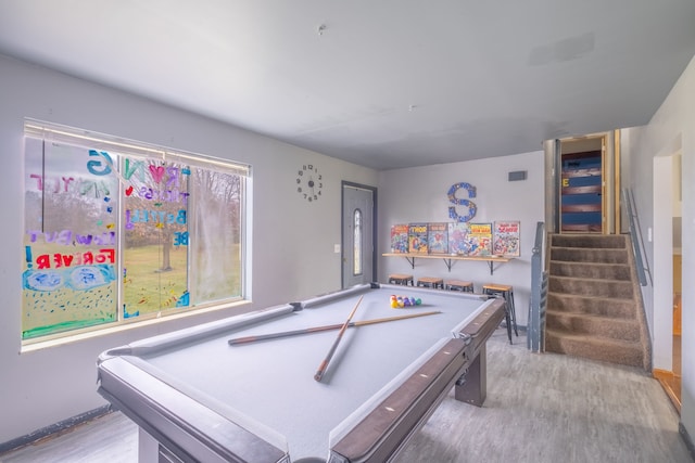 rec room with light hardwood / wood-style flooring and pool table