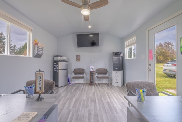 interior space with hardwood / wood-style floors, ceiling fan, and lofted ceiling