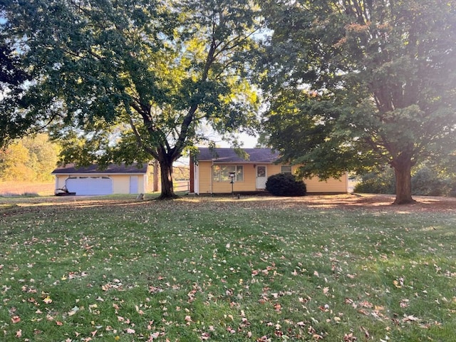 ranch-style home with a front lawn