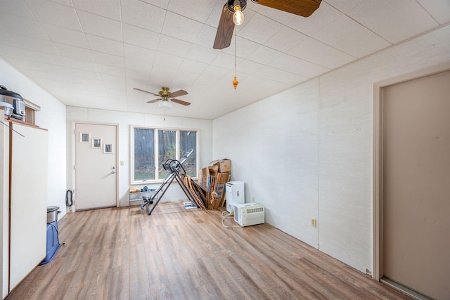 miscellaneous room featuring hardwood / wood-style flooring and ceiling fan