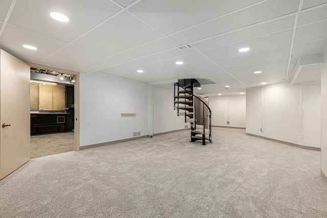 workout room with carpet and a drop ceiling