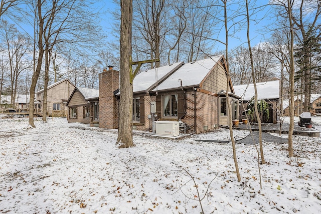 view of snow covered property