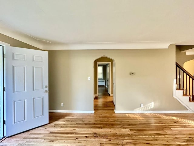 spare room featuring light hardwood / wood-style flooring