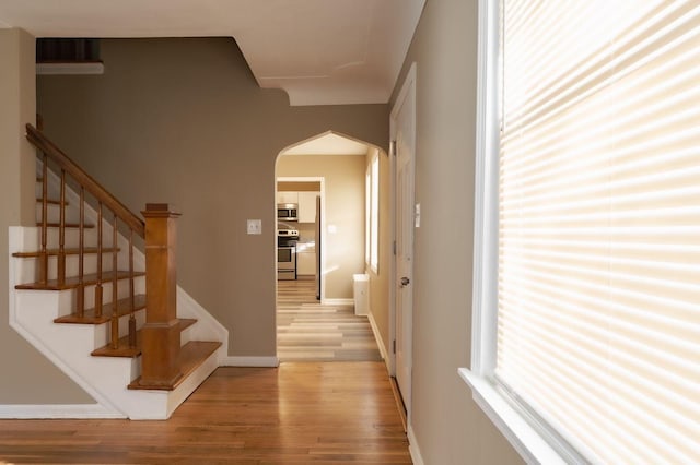 corridor featuring light hardwood / wood-style floors